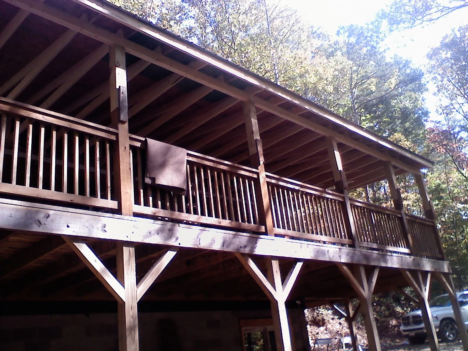 Timber framing under a new elevated porch and deck — Roof Leak Repair in Montgomery by Roofing Brothers